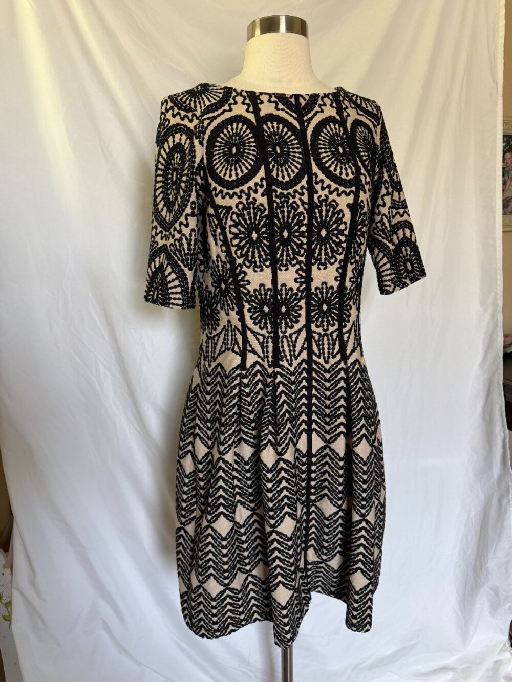Gabby Skye Tan and Black Dress With Embroidered Pattern